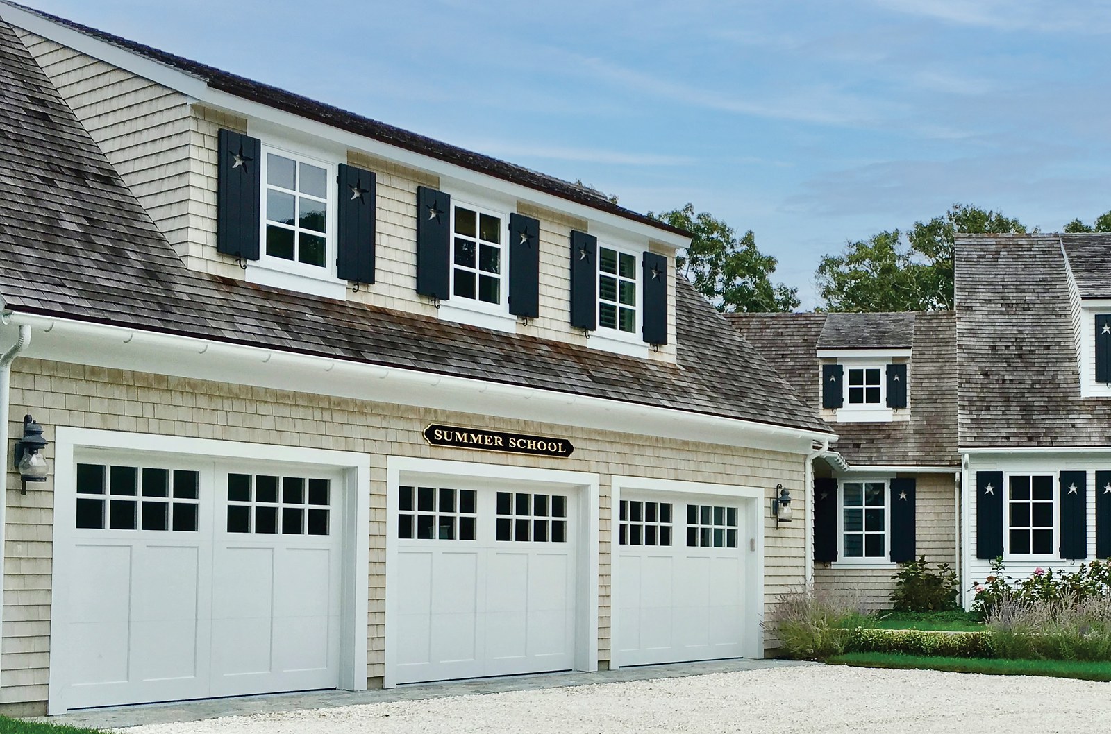 Cape Cod paneled custom wood garage door